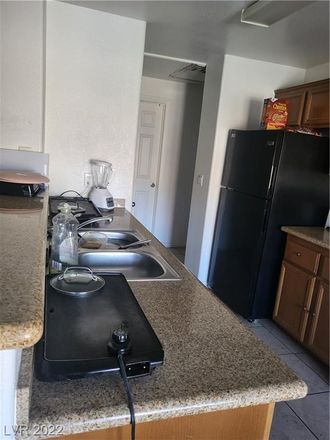Rent this 3 bed condo on 7701 West Robindale Road in Enterprise, NV 89113