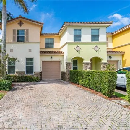 Rent this 3 bed townhouse on 7839 Rodeo Village Place in Davie, FL 33328