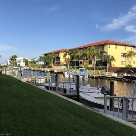 Rent this 2 bed condo on 1417 Chesapeake Ave Apt 101 in Naples, Florida