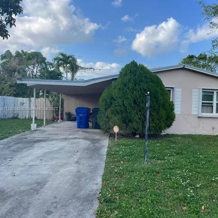 Buy this 3 bed house on 4311 Northwest 59th Street in Pompano Park, North Lauderdale