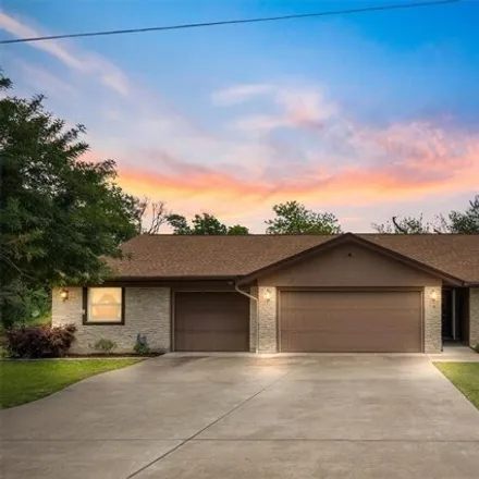 Buy this 4 bed house on 8503 La Tosca Drive in Travis County, TX 78736