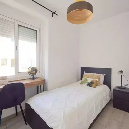 Rent this studio room on Avenida São João de Deus in 1000-009 Lisbon, Portugal