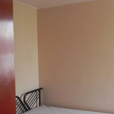Rent this 3 bed apartment on Avenida São João in Pae Cará, Guarujá - SP