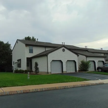 Buy this 2 bed townhouse on 801 Poplar Court in Raritan Township, NJ 08822