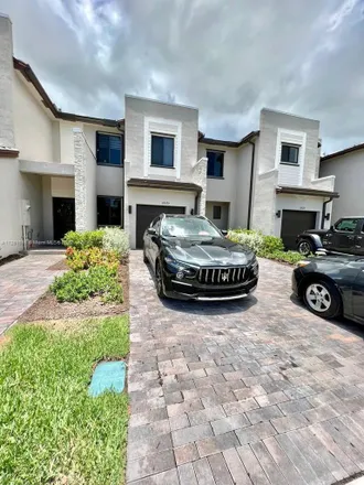 Rent this 3 bed townhouse on 539 Northeast 210th Terrace in Miami-Dade County, FL 33179