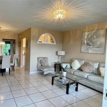 Buy this 1 bed townhouse on 100 Northwest 204th Street in Andover Golf Estates, Miami Gardens