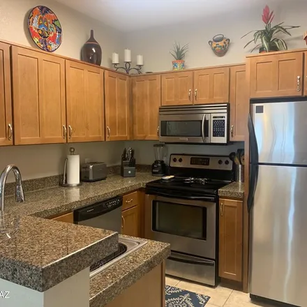 Rent this 3 bed apartment on 1636 East Pusch Wilderness Drive in Oro Valley, AZ 85737