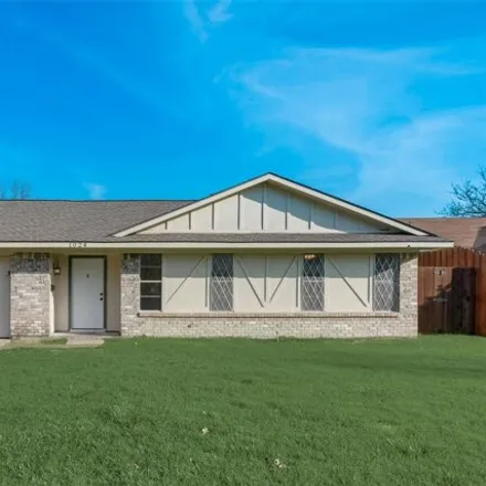 Rent this 3 bed house on 1092 Sunset Drive in Garland, TX 75040
