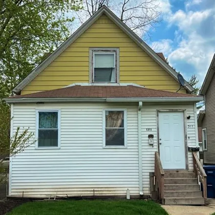 Buy this 4 bed house on 1323 Lincoln Street in North Chicago, IL 60064