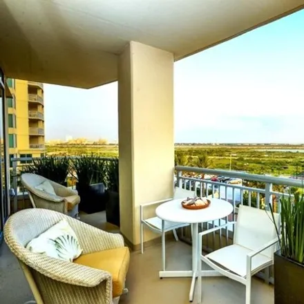 Rent this 2 bed condo on Palisade Palms in 801 East Beach Drive, Galveston