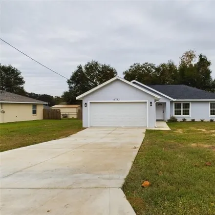 Buy this 3 bed house on 6733 Northwest 6th Avenue in Marion County, FL 34475