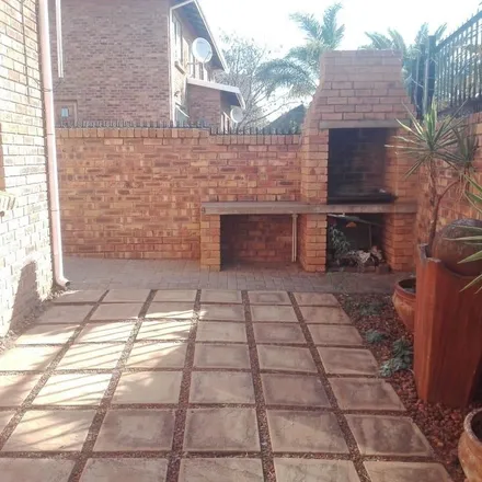 Rent this 2 bed townhouse on Gascony Crescent in Pentagonpark, Bloemfontein