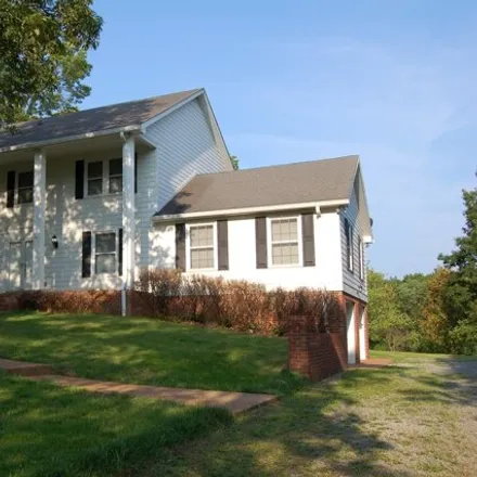 Rent this 4 bed house on 593 Forest Retreat Road in Rolling Acres, Hendersonville