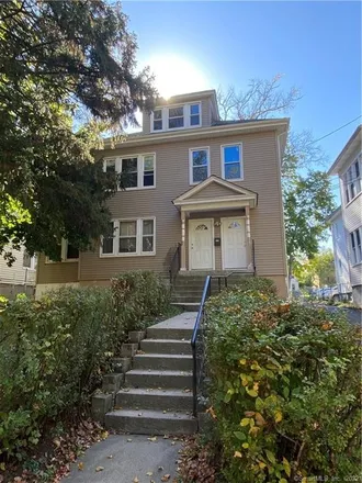 Buy this studio townhouse on 104 Westbourne Parkway in Hartford, CT 06112