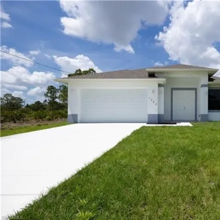 Buy this 3 bed house on 937 Gleason St in Lehigh Acres, Florida