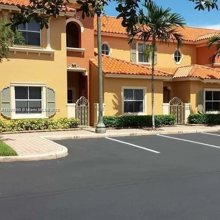 Rent this 3 bed townhouse on 4952 Windward Way in Avon Park, Dania Beach