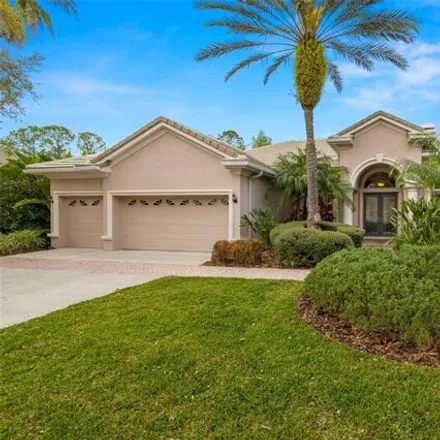 Buy this 5 bed house on 5030 Landstar Way in Tampa, FL 33647