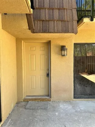 Rent this 2 bed condo on 5303 Bamboo Court in Orlando, FL 32811