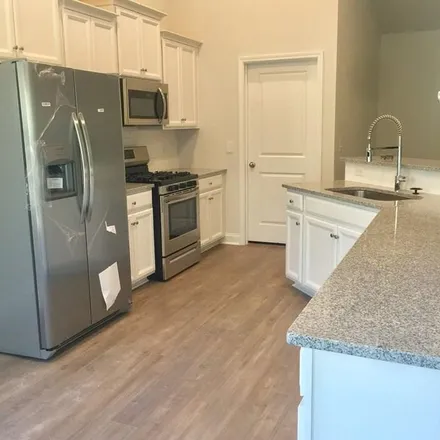 Rent this 3 bed apartment on 5395 Abbey Park Loop in Legends, Horry County