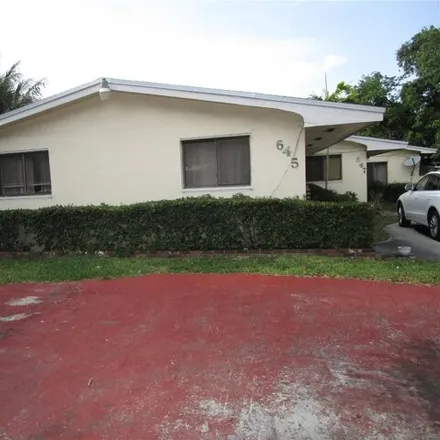 Buy this studio house on 645 Northeast 151st Street in Shady Oaks Trailer Park, Miami-Dade County