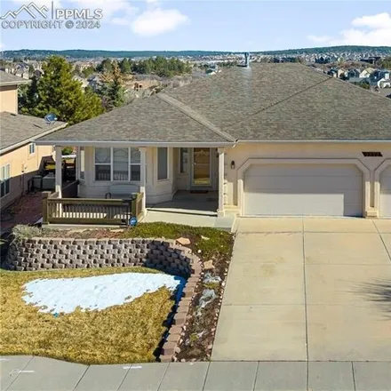 Buy this 4 bed house on 1888 Queens Canyon Court in Colorado Springs, CO 80921