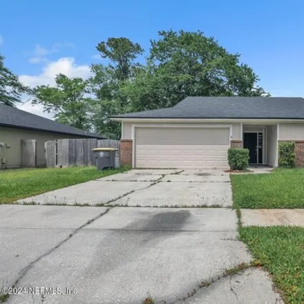 Rent this 3 bed house on 7353 Sweet Rose Lane in Jacksonville, FL 32244