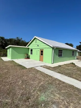 Buy this 3 bed house on 2410 San Marcos Avenue in Fort Pierce, FL 34946