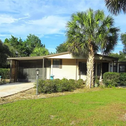 Buy this studio apartment on 8042 County Road 109B in Lady Lake, FL 32159