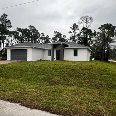 Buy this 3 bed house on Crawford Avenue North in Lehigh Acres, FL 33971