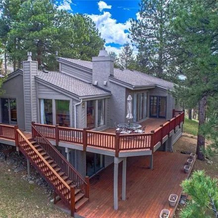 Buy this 4 bed house on 1602 Tamarac Drive in Jefferson County, CO 80401