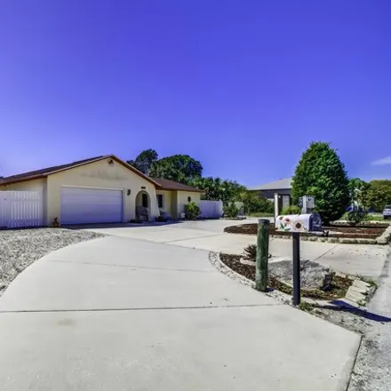 Buy this 3 bed house on 7292 Southwind Drive in Hudson, FL 34667