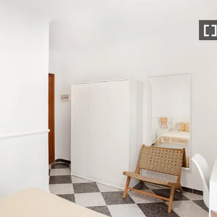 Rent this 14 bed room on Carrer de l'Imatger Bussi in 46022 Valencia, Spain