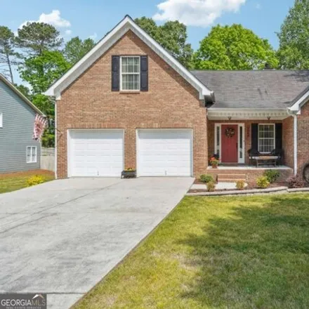 Buy this 4 bed house on 1586 Millennial Lane in Gwinnett County, GA 30045