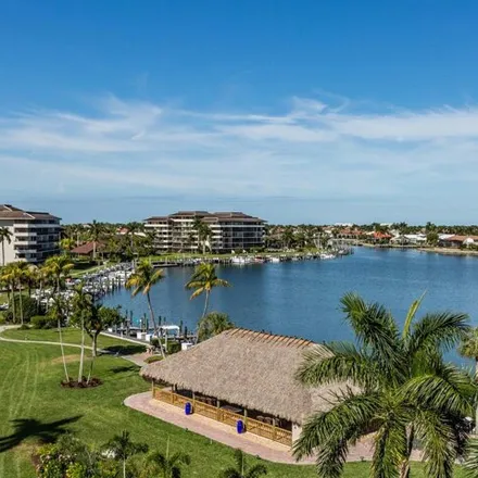 Buy this 2 bed condo on Bayside Court in Marco Island, FL 33937