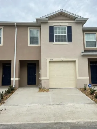 Rent this 3 bed townhouse on Tanager Street in Highlands County, FL