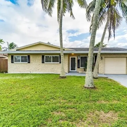 Buy this 4 bed house on 3254 Northwest 64th Street in Palm Aire, Fort Lauderdale