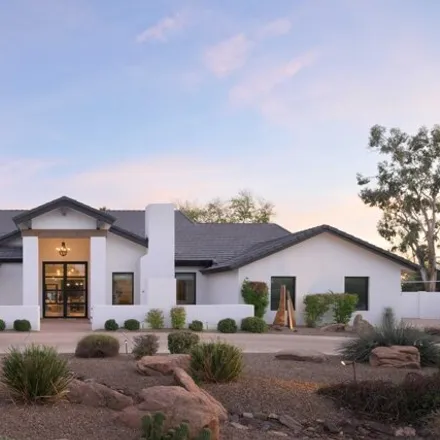 Buy this 4 bed house on 12007 N 62nd Pl in Scottsdale, Arizona