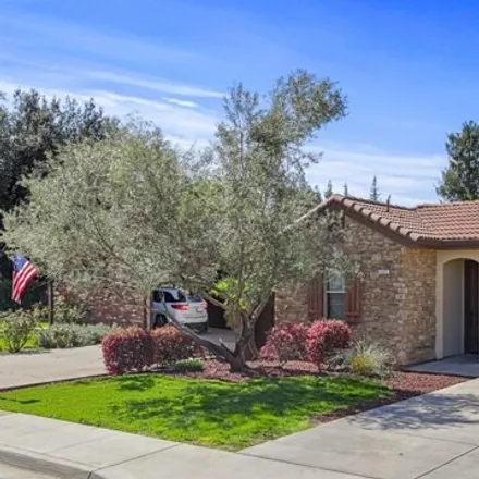 Buy this 4 bed house on 1361 Magnolia Avenue in Aurora, Modesto