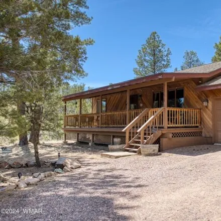 Buy this 2 bed house on 3346 Whispering Pine Drive in Navajo County, AZ 85933