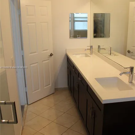 Rent this 3 bed apartment on 8678 Northwest 113th Court in Doral, FL 33178