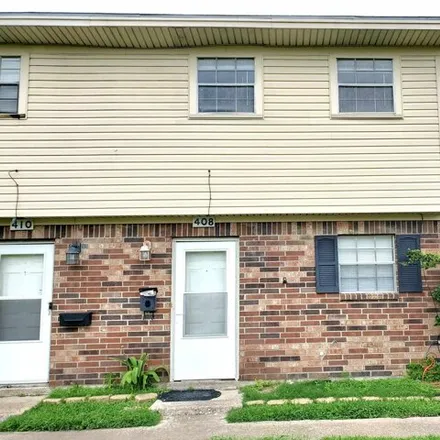 Rent this 2 bed townhouse on 438 10th Street in Nederland, TX 77627