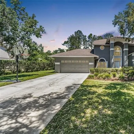 Buy this 4 bed house on 17913 Clear Lake Drive in Lutz, FL 33548