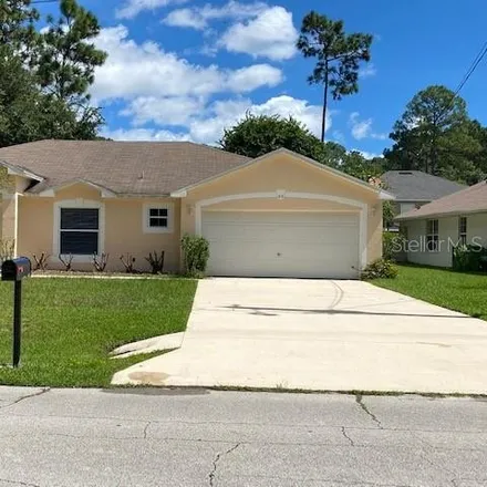 Buy this 3 bed house on 85 Laguna Forest Trail in Palm Coast, FL 32164