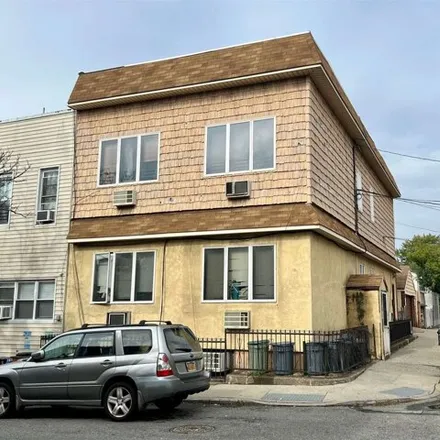 Buy this 8 bed duplex on 55-05 Arnold Avenue in New York, NY 11378