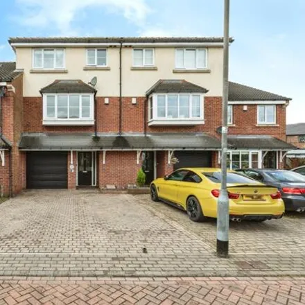 Buy this 4 bed townhouse on St Johns Walk in Little Preston, LS26 8GY