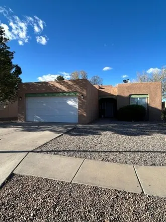 Rent this 3 bed house on 3903 Sundrop Place Northwest in Albuquerque, NM 87114