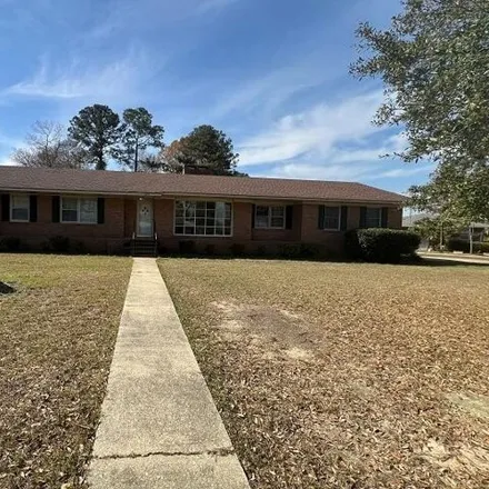 Rent this 4 bed house on 219 Lesesne Drive in Burns Down, Sumter