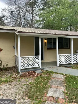Rent this 2 bed house on 450 South May Street in Oakwood Homes Mobile Home Park, Kingsland