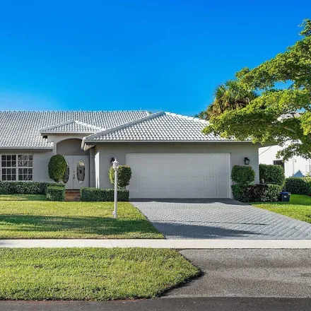 Rent this 4 bed house on 4572 White Cedar Lane in Delray Beach, FL 33445