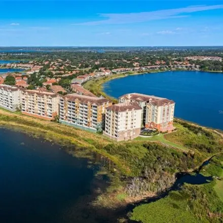 Buy this 4 bed condo on The Esplanade in Dr. Phillips, FL 32819